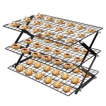 3 Tier Collapsible Cooling Rack, Outdoor Camping Picnic Shelf, Wire R.... Fixed Price $40.73.