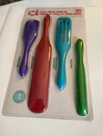 Kitchen Four Piece Silicone Utensils. Fixed Price $11.00.
