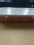Temptations By Tara Orange Floral Lace Long Oval 3 Quart Bowl With Plastic Lid. Fixed Price $29.00.