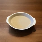The Pampered Chef Stoneware 06302 Oval Casserole Dish 8" Beige Colored Usa. Fixed Price $14.00.