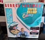 George Foreman Grill Colors Blue Vintage Salton 2001 GR10ABWI New Open Box. Fixed Price $18.99.