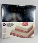 Decorative Square 14 / 16 Inch Silver Cake Bases 2 Count From Wilton. Fixed Price $29.99.