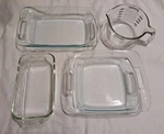 Set Of 4 Pyrex Clear Glass Baking Dishes Loaf Pan Cup Measuring. Fixed Price $37.99.