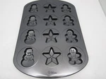Wilton Cookie Pan Mold Christmas 12 Designs Star Snowman Holiday Baking. Fixed Price $10.99.
