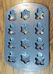 Wilton Christmas Snowflake Gingerbread Man Non-stick Cookie Pan. Fixed Price $7.00.