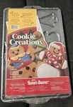 Ekco Bakers Secret Holiday Cookie Creations Non-stick Bakeware Snowman Tree. Fixed Price $14.49.