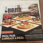 Bialetti Pizza Tiles Serving Stone 4 Piece Set 7.5X7.5 Taste Of Italy 07330. Fixed Price $19.99.