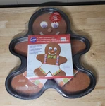 Wilton Gingerbread Cookie Decorating Kit Non Stick Pan #2105-6236. Fixed Price $7.49.