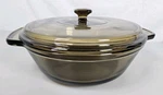 Anchor Hocking 2 Quart Amber Brown Glass Casserole Dish With Lid 9". Fixed Price $14.30.