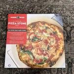 2 Piece Ceramic Pizza Stone With Steel Holder 13" X Absorbs Moisture. Fixed Price $22.90.