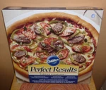Wilton Perfect Results Premium Stoneware 15" Round Pizza With Rack. Fixed Price $64.75.