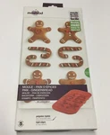 Mastrad Paris Silicone Flexable Baking Molds Christmas Gingerbread Candy Cane. Fixed Price $13.99.