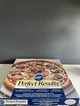 Wilton Perfect Results Premium Stoneware 15" Round Pizza With Rack. Fixed Price $59.99.