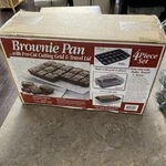 Brownie Pan 4-PIECE Set With Pre-cut Cutting Grid & Travel Lid New Rare. Fixed Price $20.00.