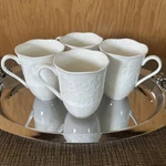 Lenox Butterfly Meadow Cloud White Stoneware Embossed Coffee Cup Set 4. Fixed Price $49.99.
