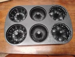 Nordic Ware Garland Bundtlette Cake Pan 6 Cups 1.4 Liters. Fixed Price $25.19.