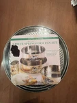 Elite Line 3-PIECE Spring Form Pan Set 9", 9. 3/4", 10 5/8" New. Fixed Price $18.99.