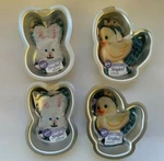 Set Of New Wilton Singles Cake Pans Bunny Heads Chicks 2105-1142 2105-1143. Fixed Price $18.99.