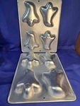 Set Of Little Ghosts Minicake Pans From Wilton 2105-9471. Fixed Price $18.74.