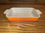 Le Creuset Stoneware Flame Rectangular Baking Dish 18CM 7 1/4" X 5". Fixed Price $32.00.