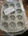 Brand New Pampered Chef Donut Pan 100019 Factory Sealed. Fixed Price $25.00.