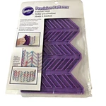 Wilton Silicone Precision Patterns Herringbone Fondant Mold Purple 409-7725 New. Fixed Price $6.99.