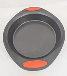 Rachael Ray Oven Lovin' 9" Round Nonstick Cake Baking Pan Orange Silicone Grips. Fixed Price $9.96.