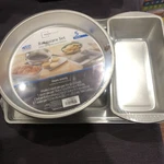 Bakeware Set 5 Pieces Mainstays 2 Round 1 Square Loaf Pan Cookie Sheet. Fixed Price $99.99.