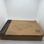 The Pampered Chef Family Heritage Stoneware Mini Fluted Pan #1441. Fixed Price $30.00.