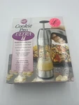Wilton Cookie Pro Ultra Ii Press Complete Set 16 Disks. Fixed Price $20.24.