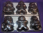 Chicago Metallic Bakeware 6 Cup 3 Mold Christmas Pan Tree Santa Gingerbread Man. Fixed Price $12.00.