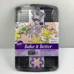Wilton 11.5 X 17 1/4 Baking Sheet W/ Cooling Grid & 2 Cookie Cutter. Fixed Price $24.89.