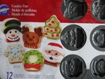 Wilton Christmas Cookie Sheet Baking Pan Shapes Molds Non Stick 6 Holiday Design. Fixed Price $29.89.