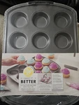 Wilton Bake It Better 12-CUP Non-stick Carbon Steel Muffin Pan W/ Tall Lid. Fixed Price $14.99.
