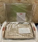 2PC David's Cookie Sheets 17.5"X14" & Rachael Ray Crisper Set 20"X12" - New. Fixed Price $33.00.