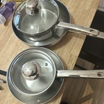 Tools Of The Trade Stainless Steel Four-piece Set Saucepan Frying Lids. Fixed Price $50.00.