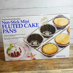 Progressive International Mini Fluted Cake Pan Non Stick Professional Makes 6 Cw. Fixed Price $20.40.