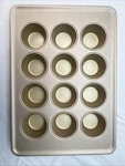 Oxo Good Grips Nonstick Pro Gold Coated 12 Cup Muffin Pan. Fixed Price $45.00.