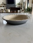 Le Creuset Flint Beige Ceramic Pie Dish Round Oven Safe 10 1/2. Fixed Price $49.99.