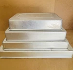 4 Rectangular Wilton Cake Wedding Pans. Fixed Price $20.00.