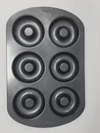 Wilton 6-CAVITY Donut Baking Pan, Non-stick, Gray, Used. Fixed Price $12.71.