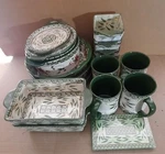 Bakeware Temp-tations Tara Old World Green & Poinsettia Assorted. Fixed Price $8.00.