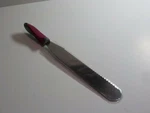 Trudeau Maison Stainless Steel Cake Knife. Fixed Price $9.99.