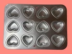 Wilton Petite Pans Makes 12 Candy/cake Hearts In #2105-2432 1992. Fixed Price $20.00.