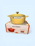 Creuset Enameled Cast Iron Signature Round Dutch Oven 3.5QT, Mimosa. Fixed Price $285.00.