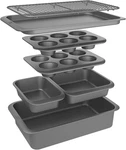 7-PIECE Nesting Bakeware Set Carbon Steel Nonstick Baking Sheet, Loaf Pan, Muf. Fixed Price $100.99.