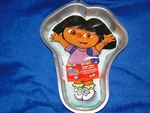 New Vintage Wilton Dora The Explorer Cake Pan 2105-6300. Fixed Price $19.99.