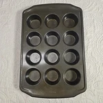 Wilton 16.5" Non-stick Dozen 2.75" Muffin Cupcake Baking Pan. Fixed Price $5.00.