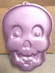 Wilton Skull Cake Candy Pan Mold Purple Aluminum Halloween Party 2105-2099 New. Fixed Price $10.99.