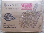 Gyreuni Oak Pizza Set, Stone, Rocker Cutter, Rack, Peel Paper Hs. Fixed Price $34.98.